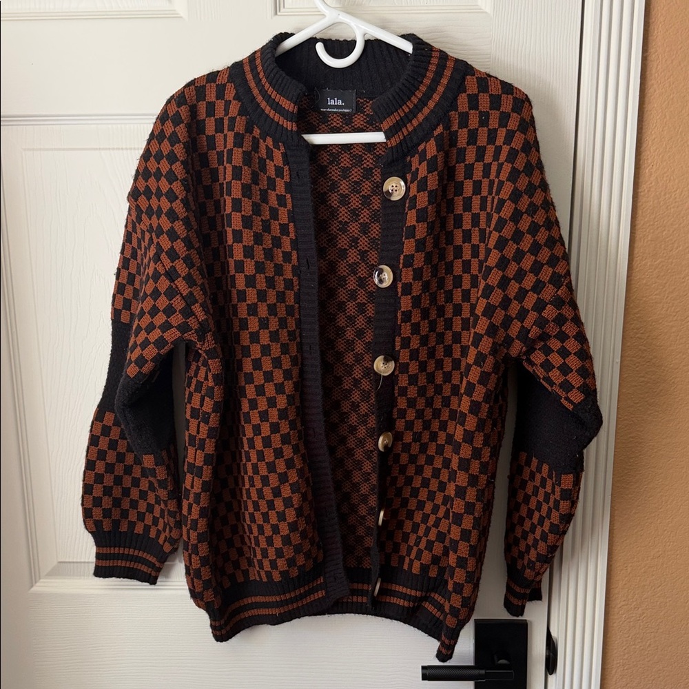 Dressed in Lala Checkerboard Button-Up Cardigan in Black & Rust